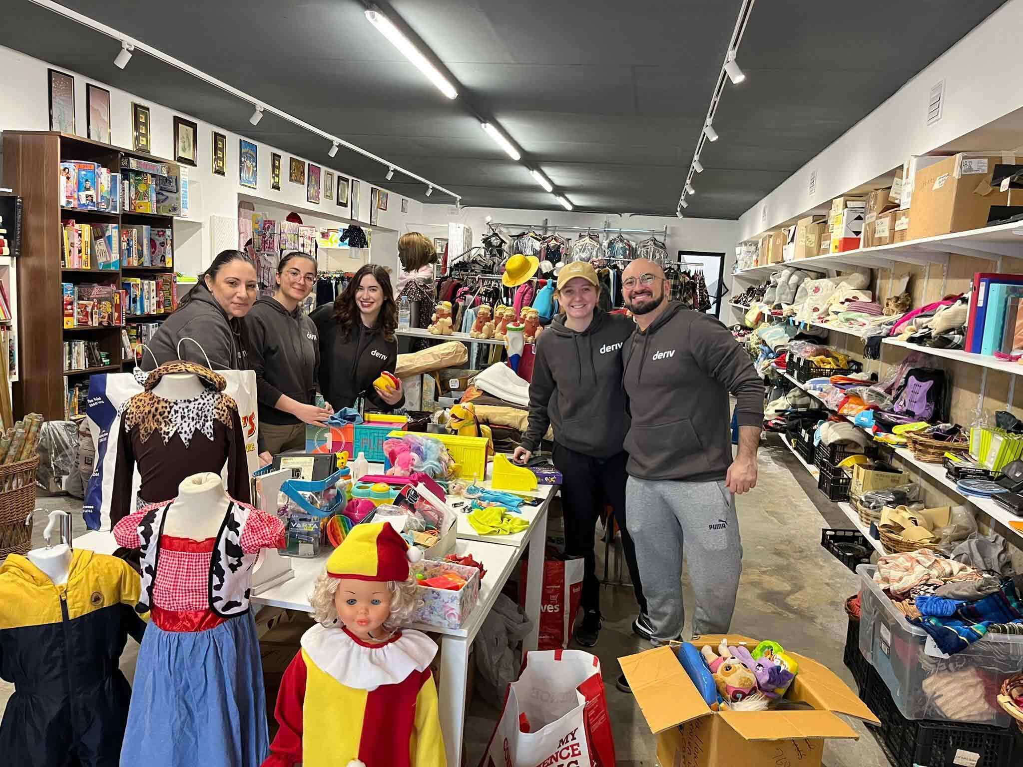 Deriv volunteers at a charity shop in Qawra, Malta