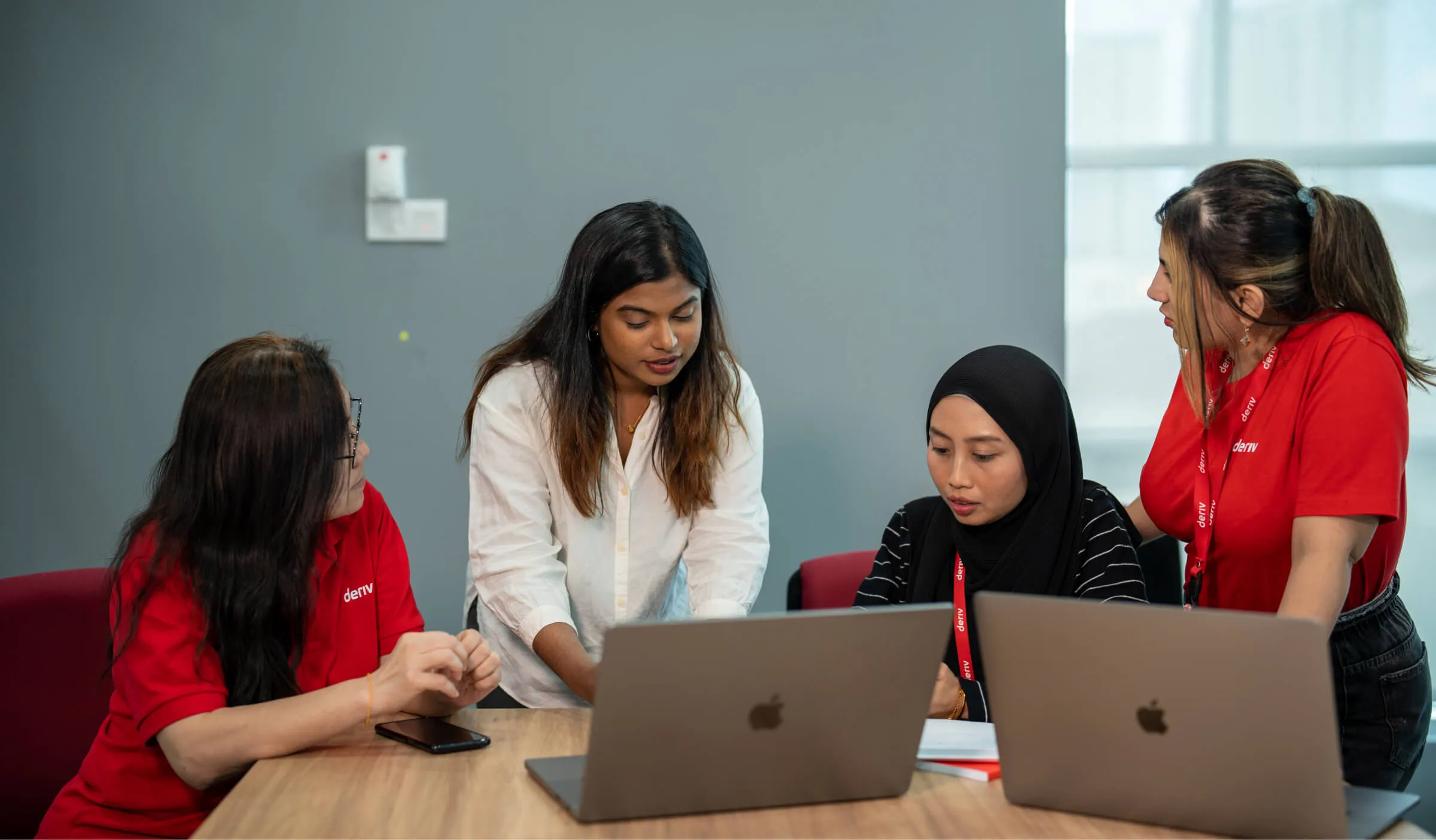 The software testing team brainstorming together