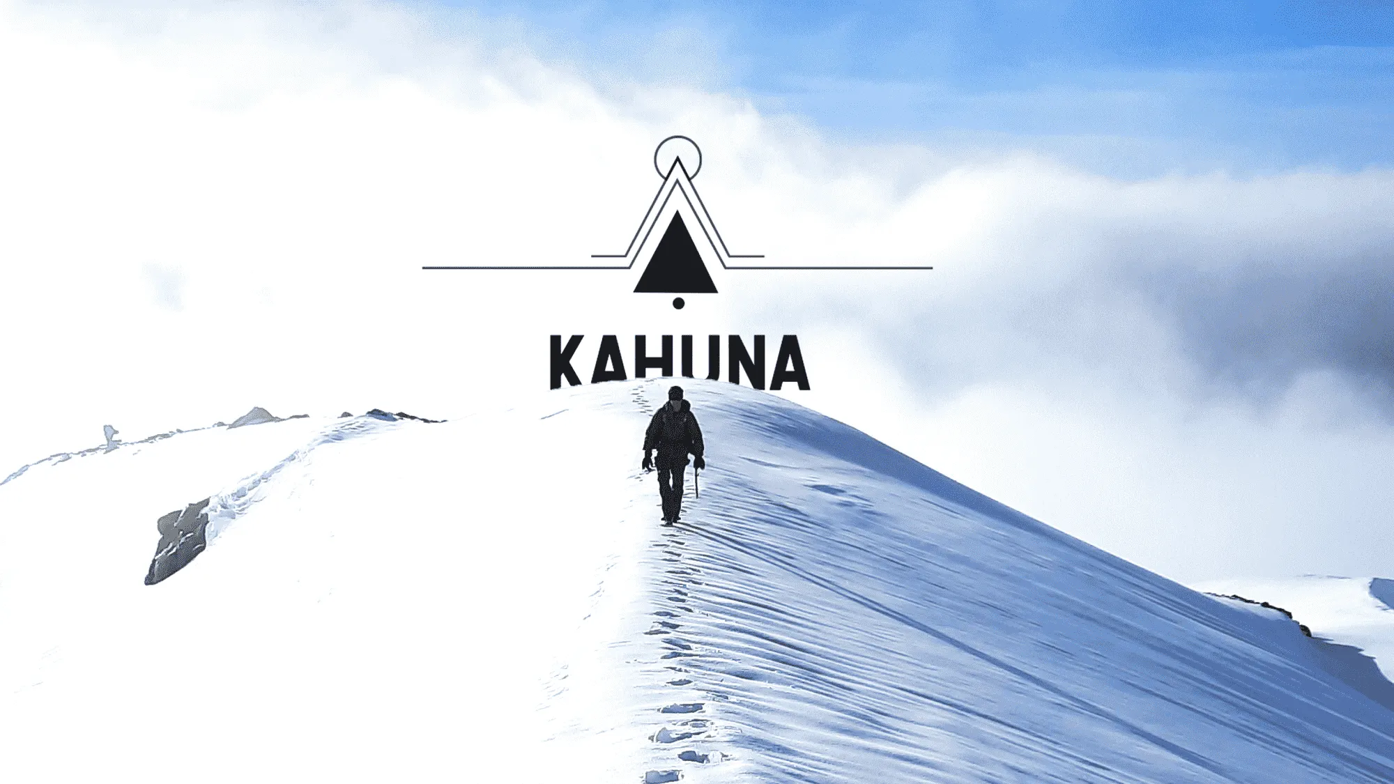 A Kahuna team member walking in the snow