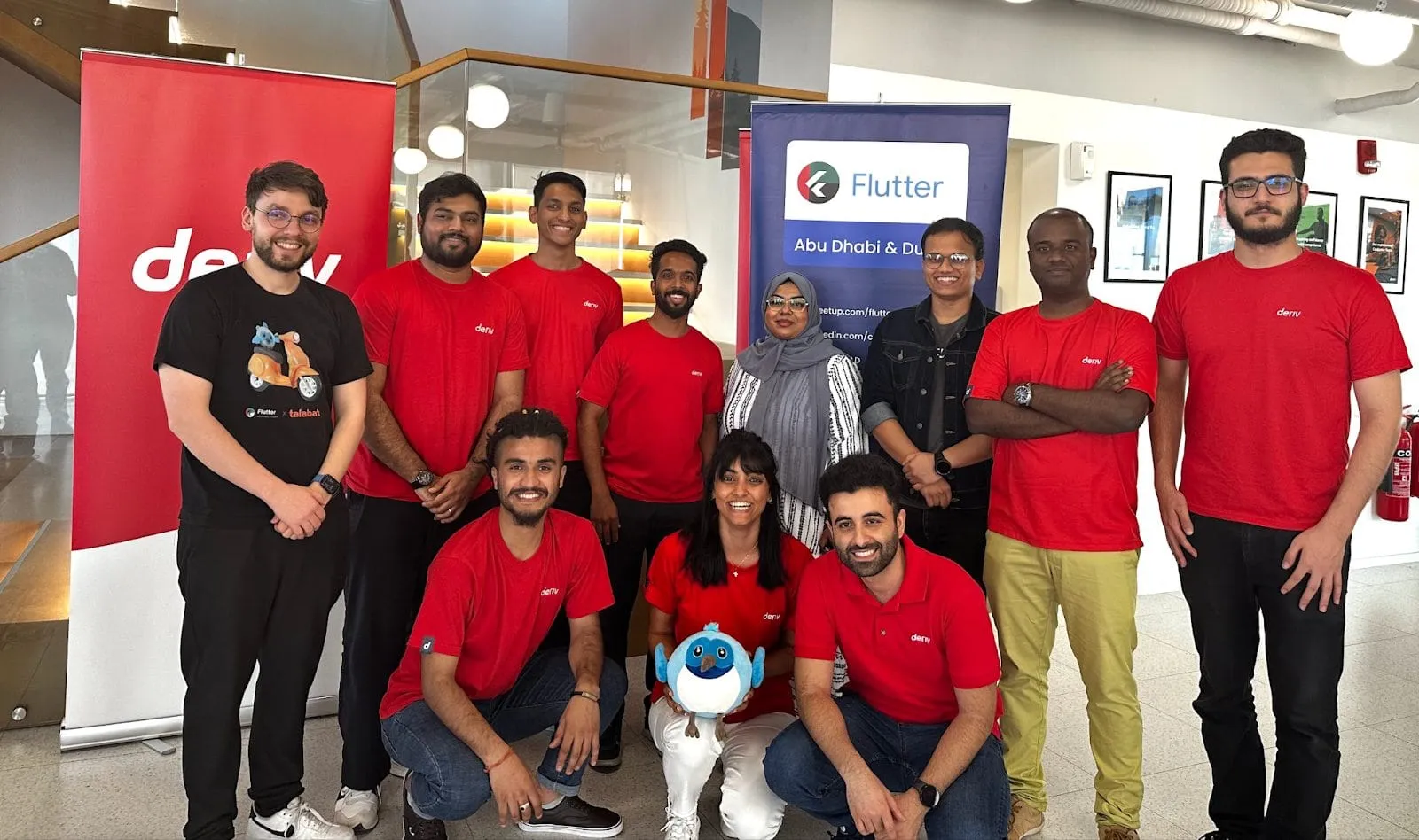 A group picture of the Deriv and Flutter organising team.